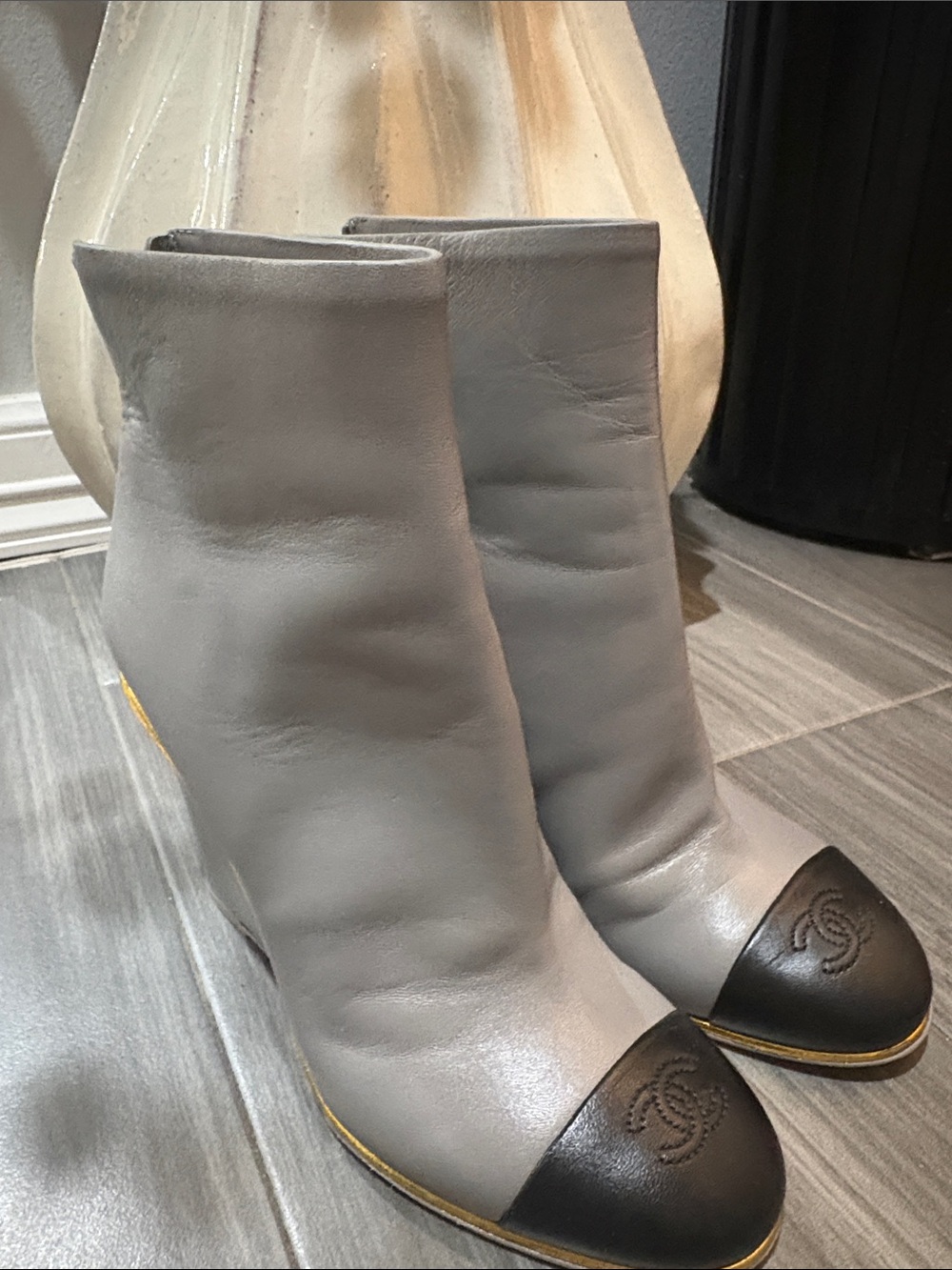 CHANEL Gray Leather Ankle Boots with Black Cap Toe